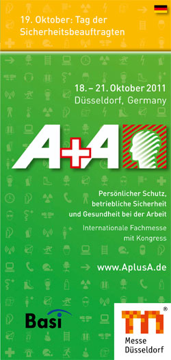 Grünes Poster mit A+A Logo und Text zur A+A Messe 2011 in Düsseldorf. Termine: 18.-21. Oktober 2011. Fokus auf persönlichen Schutz und betriebliche Sicherheit. Hinweis auf den Tag der Sicherheitsbeauftragten am 19. Oktober. Logoeinblendungen von Basi und Messe Düsseldorf am unteren Rand. Diverse Symbole zum Thema Arbeitsschutz im Hintergrund.