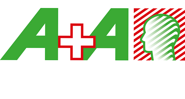 Das Bild zeigt das Logo der A+A Messe. Es besteht aus einem großen grünen 'A' gefolgt von einem roten '+' Symbol und einem weiteren grünen 'A'. Rechts befindet sich ein stilisierter Kopf in einem grünen Kreis mit roten diagonalen Streifen. Die A+A Messe steht für Arbeitssicherheit und Gesundheitsschutz bei der Arbeit, was im Kontext der Unfallkasse NRW mit Prävention und Schutzmaßnahmen verbunden ist.