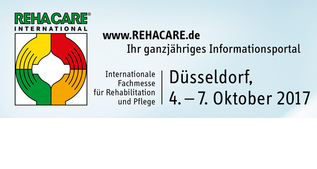 Das Bild zeigt ein Plakat für die RehaCare International, eine internationale Fachmesse für Rehabilitation und Pflege, die vom 4. bis 7. Oktober 2017 in Düsseldorf stattfand. Oben links befindet sich das bunte Logo der RehaCare mit einem farbigen Kreisdesign. Rechts daneben steht die URL www.REHACARE.de mit dem Hinweis: 'Ihr ganzjähriges Informationsportal'. Der Text betont den Schwerpunkt auf Rehabilitation und Pflege und könnte für die Unfallkasse NRW im Kontext von Arbeitsschutz und Prävention relevant sein.